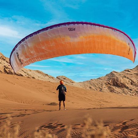 Hotel Al Badayer Retreat By Sharjah Collection Margham Esterno foto Parachute landing on the dunes