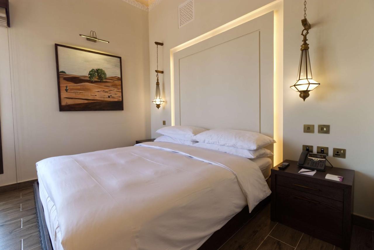 Hotel Al Badayer Retreat By Sharjah Collection Margham Esterno foto A bedroom at the hotel