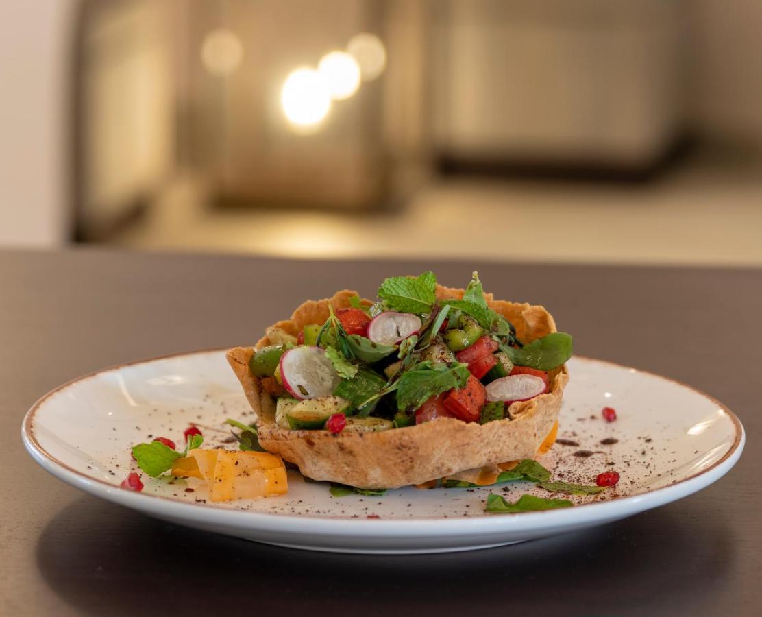 Hotel Al Badayer Retreat By Sharjah Collection Margham Esterno foto Israeli salad